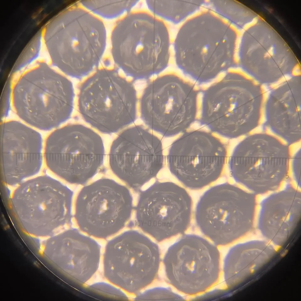 The same anilox cells viewed under a microscope after laser cleaning